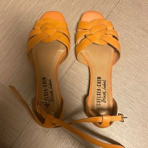 Very lightly used (only 1 time) gold sandals. Tiny wedge heel.